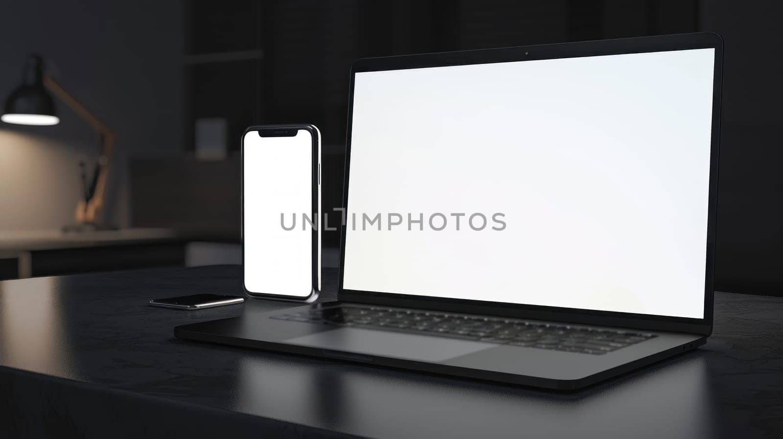 A mockup of a laptop and a phone with a white screens.