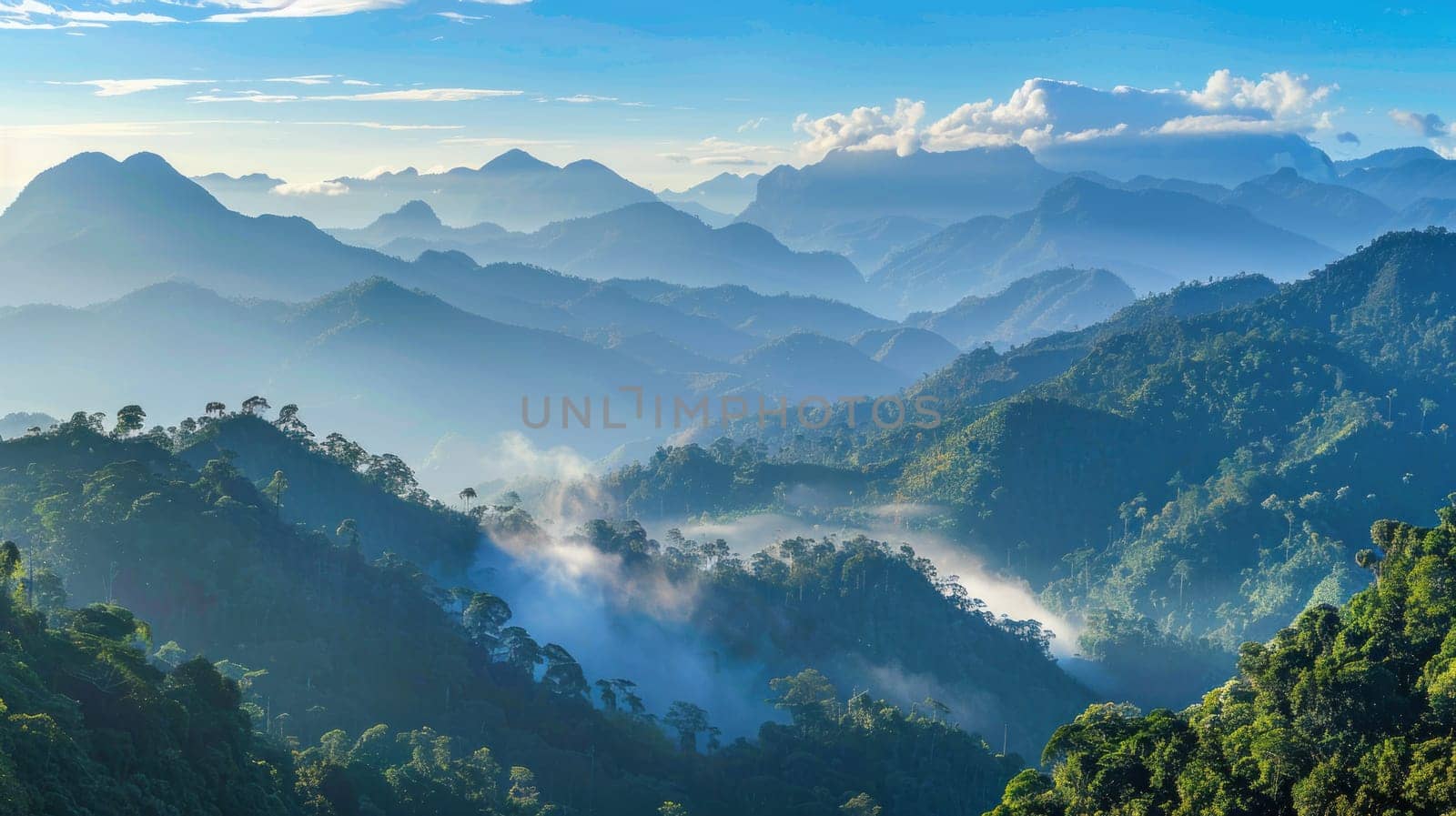 A panoramic vista of a tropical mountain range, with mist-shrouded peaks rising majestically against a backdrop of clear blue skies, offering a glimpse into the awe-inspiring grandeur of untouched.