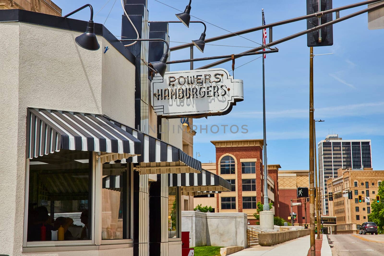 Powers Hamburgers in Fort Wayne, Indiana: A blend of historic charm and modern urban skyline.