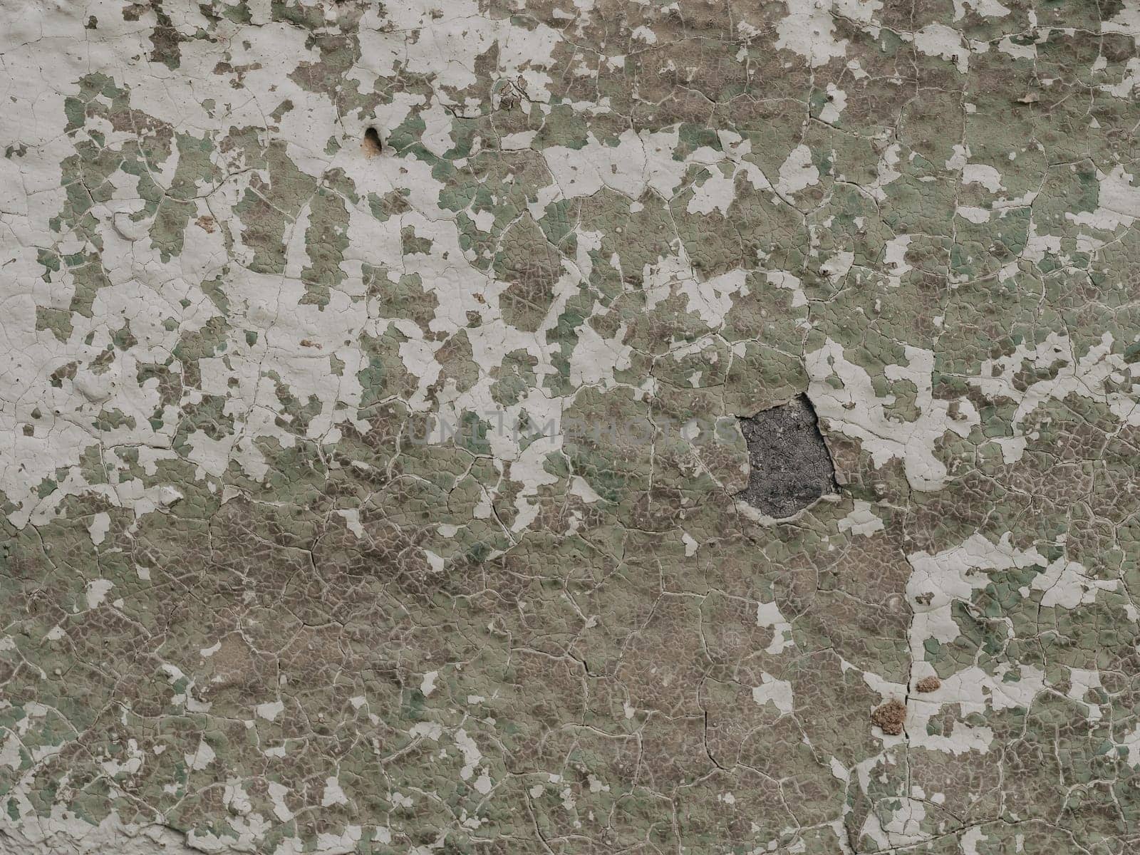 texture of old painted concrete with cracks. Grunge style cement wall background