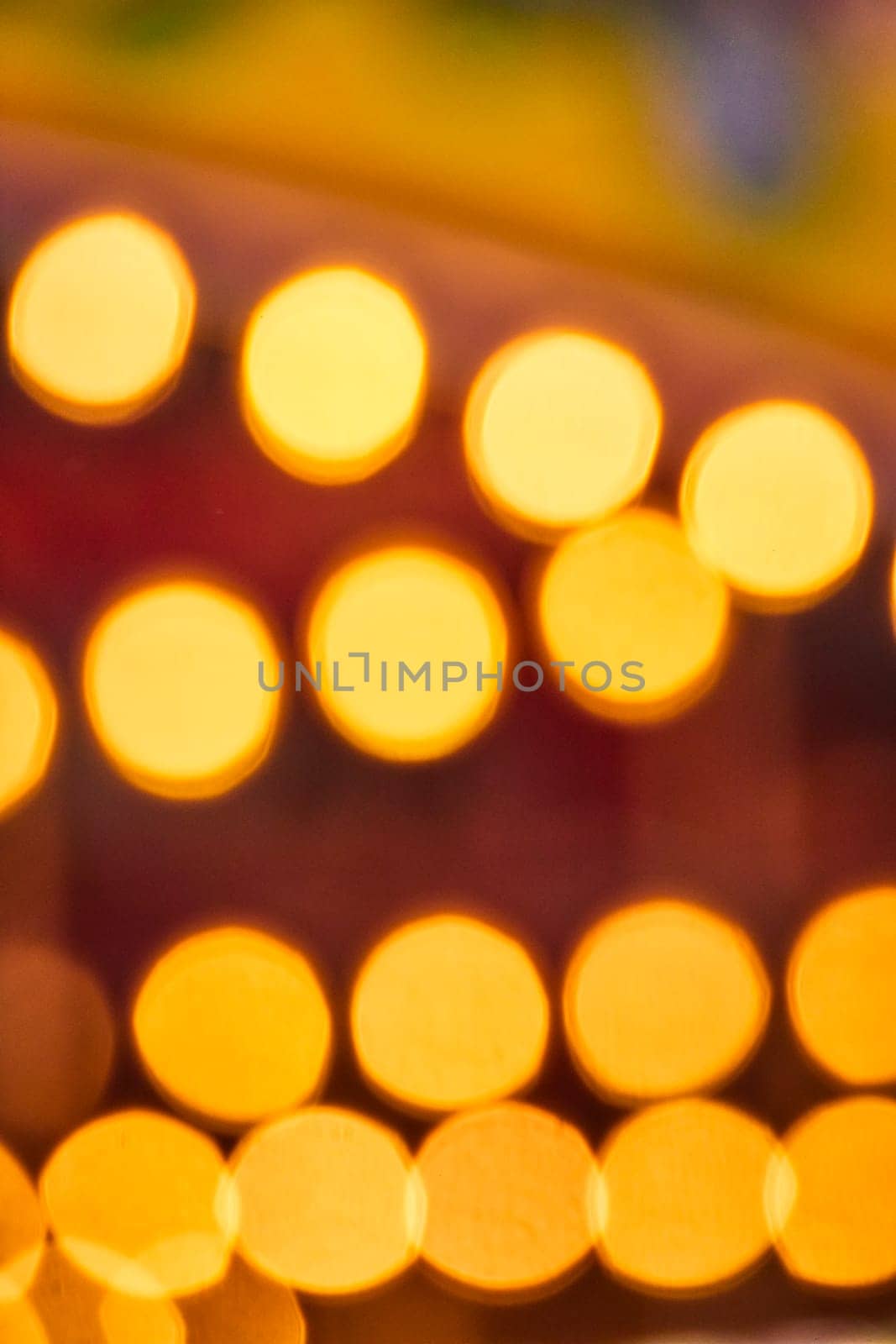 Golden bokeh lights capture the magic of a festive evening at Fort Wayne Children's Zoo.