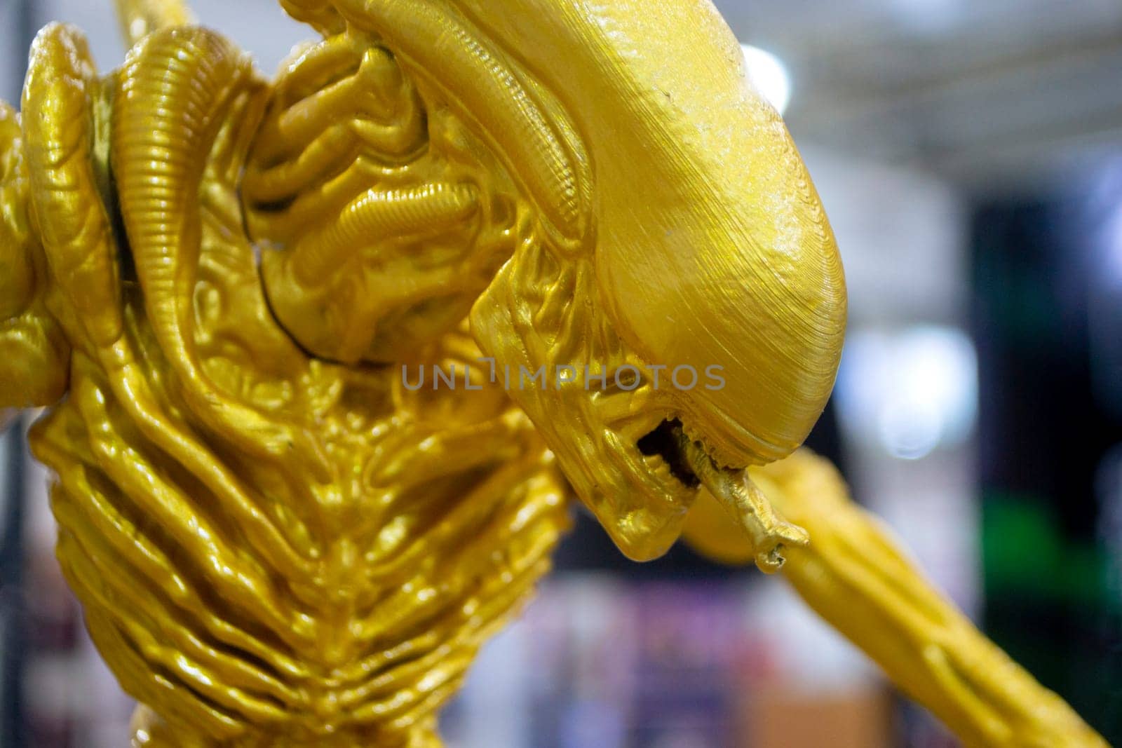 Art object printed on 3D printer. Detailed prototype model printed on 3D printer from molten plastic yellow gold color. Additive progressive 3D printing technology. New modern prototyping technologies