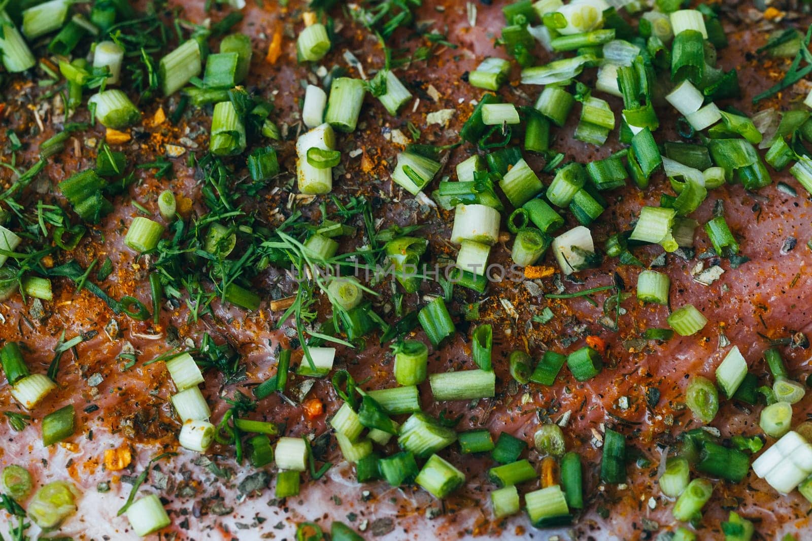 pink salmon meat with onions and Basil and spices