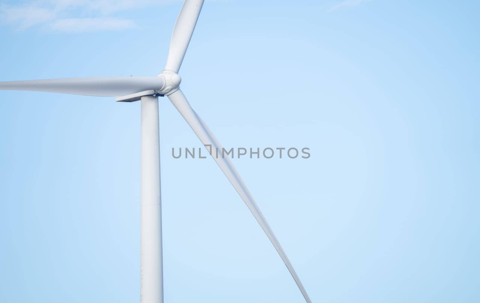 Wind energy. Wind power. Sustainable, renewable energy. Wind turbines generate electricity. Wind farm. Sustainable resources. Sustainable development. Green technology for energy sustainability.