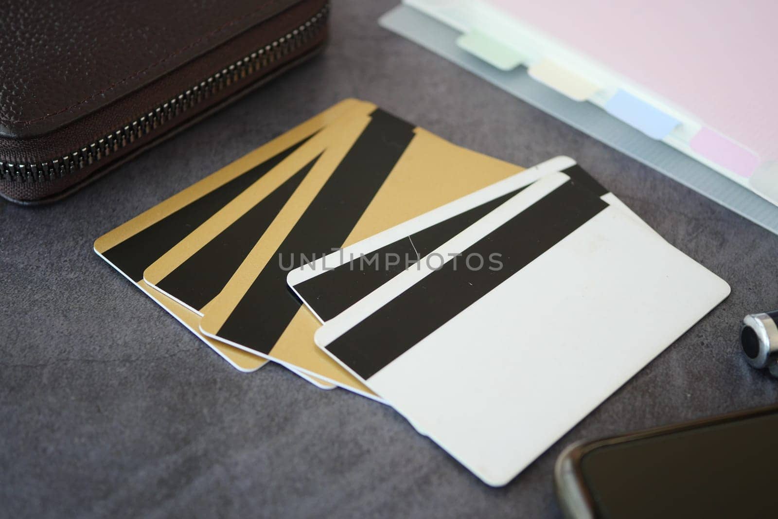 close up of credit cards on wooden background by towfiq007