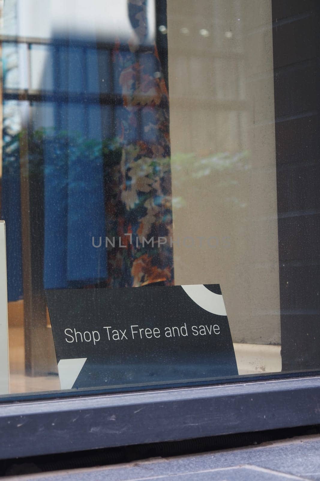 shop tax free text duty free shop sign on shop window ,