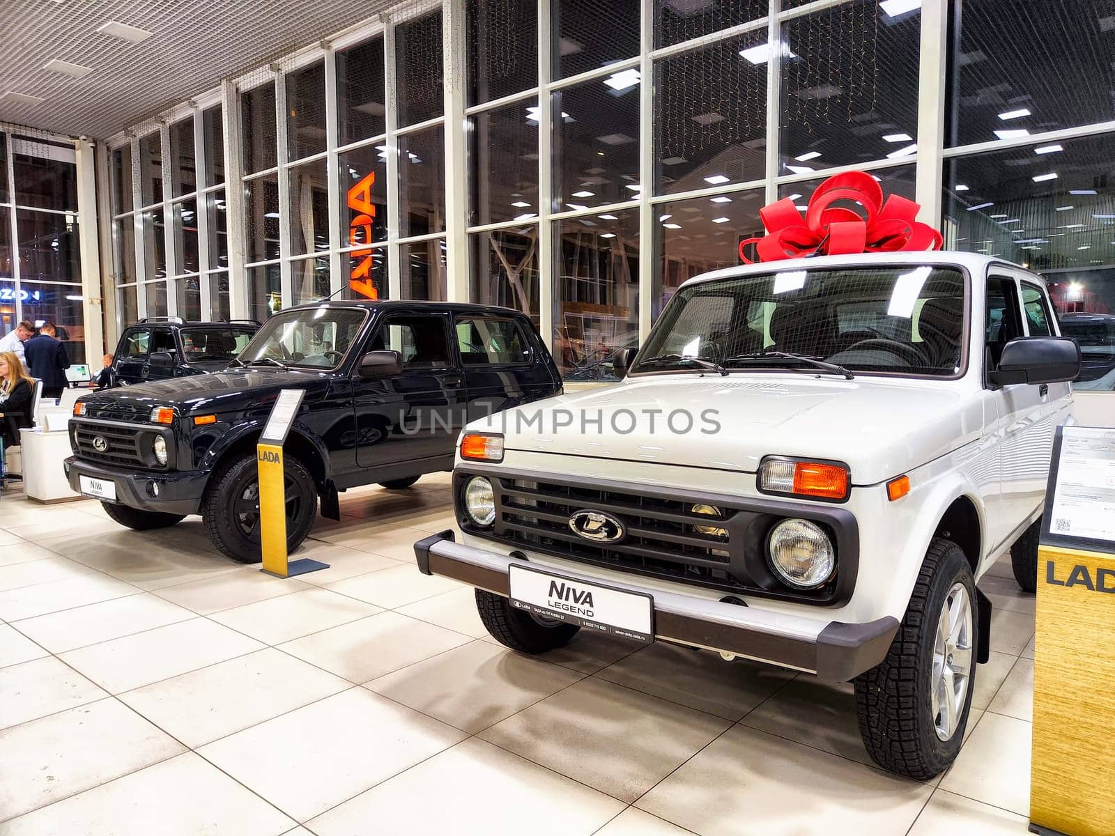 Kirov, Russia - November 21, 2023: Car in showroom of dealership Lada Avtovaz. Sale of Russian cars in Russia country