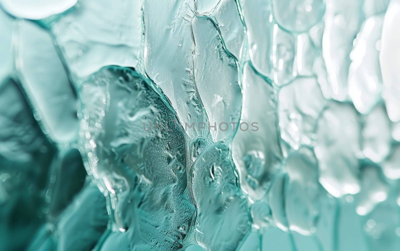 Macro shot of a glass pane with a frozen texture effect and a blend of turquoise and white hues.