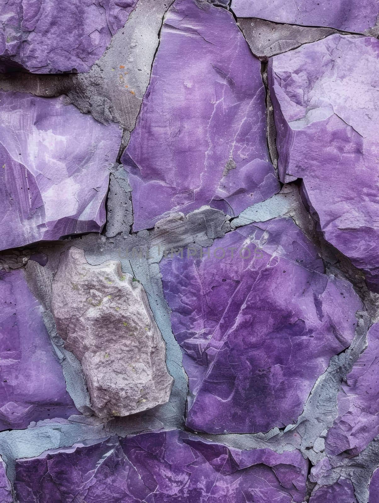 Close-up of purple painted rocks with a textured finish and subtle color variations