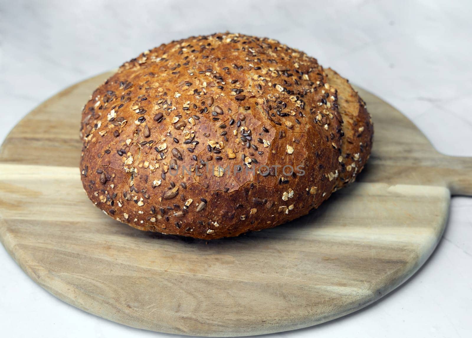 Freshly baked bread on a cutting board. High quality photo