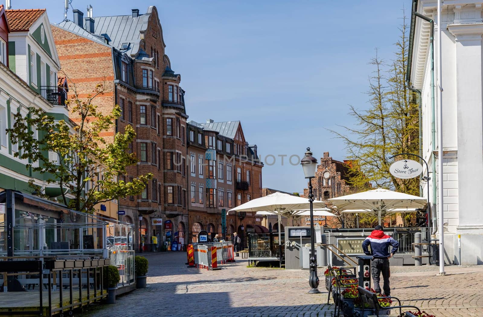 Street, Central square in the ancient city on as sunny summer day. Ystad, Sweden - May 14, 2024
