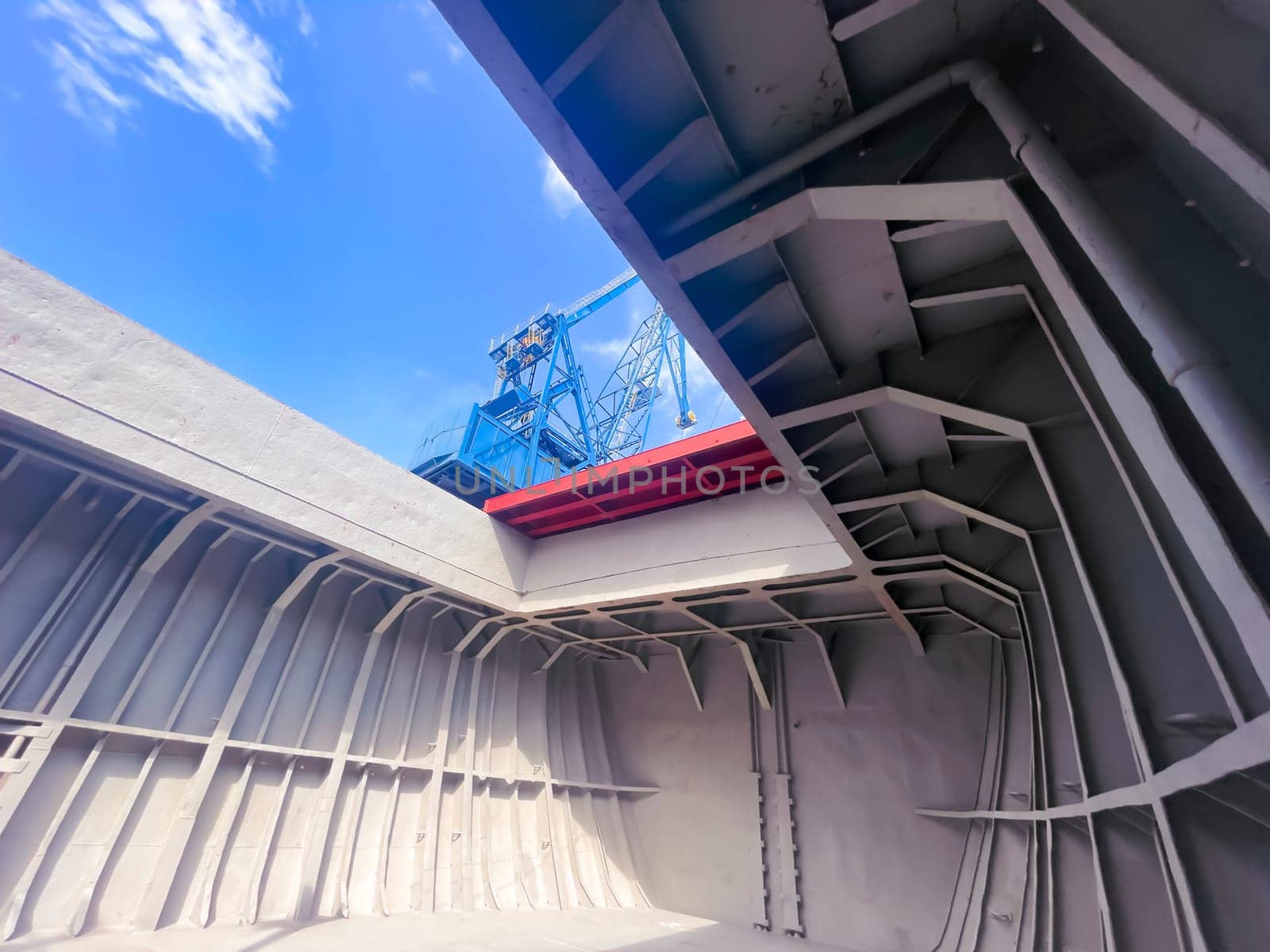 Dry cargo hold view from inside. The hold is cleaned and prepared for loading grain