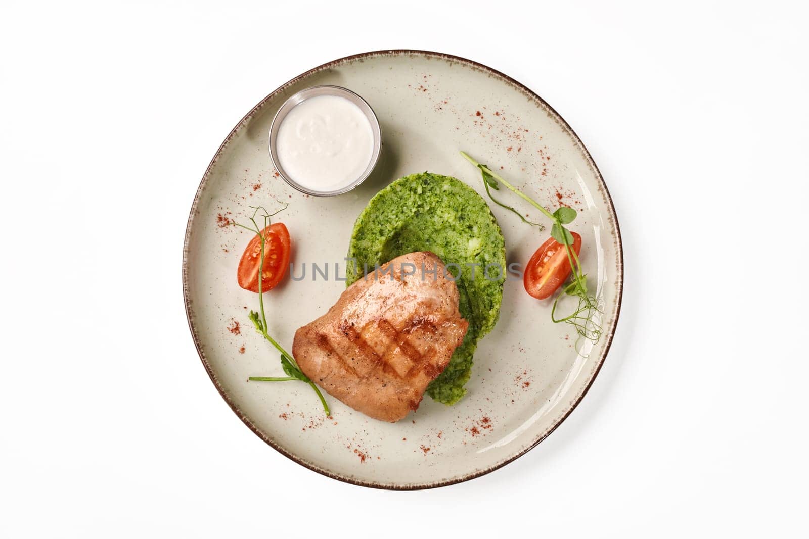 Grilled chicken breast with broccoli puree and sauce by nazarovsergey