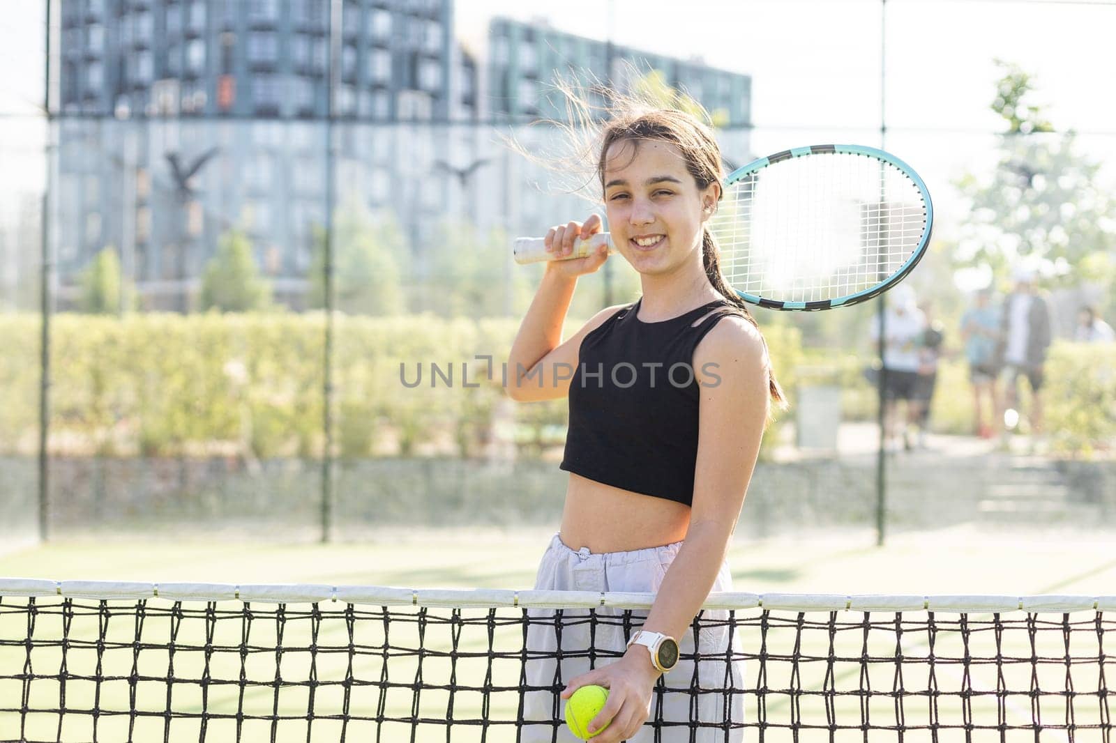 teenage tennis player woman on court with racket by Andelov13