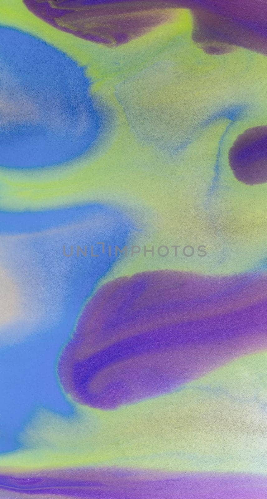 Abstract pastel marbled background with swirls in blue, yellow, and pink hues. Luxury liquid wave of grunge material, elegant wallpaper design.