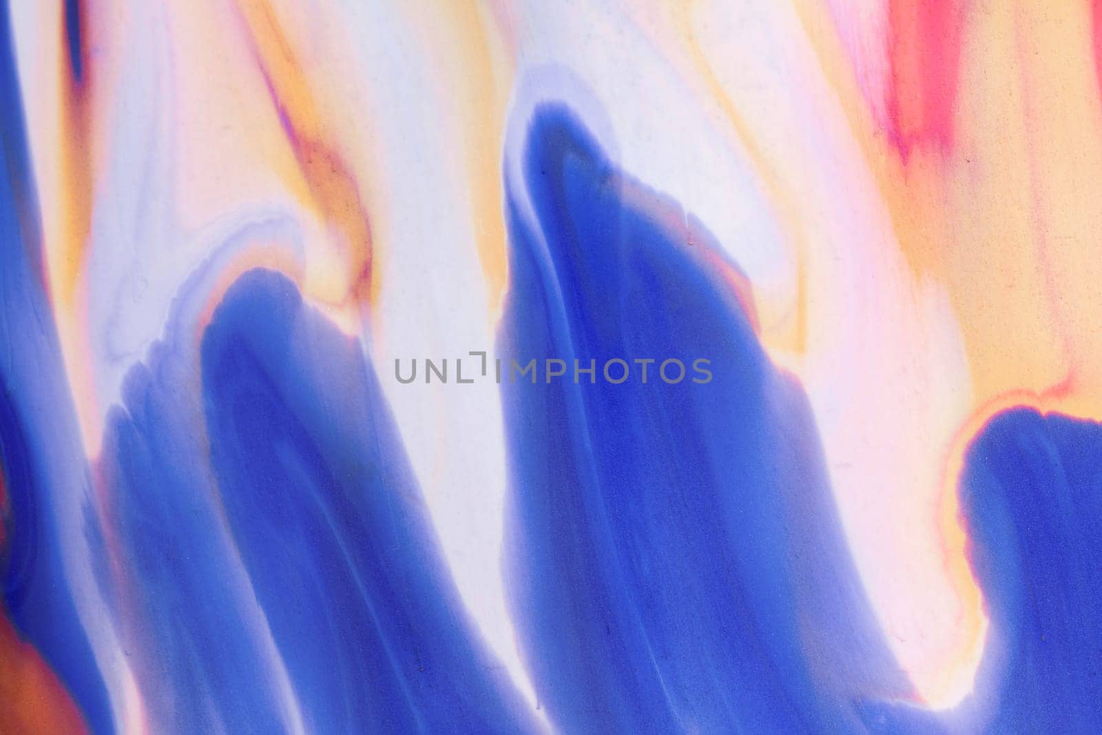 A fascinating combination of orange and blue shades of acrylic paint. Abstract background for websites, applications, invitations, business cards.