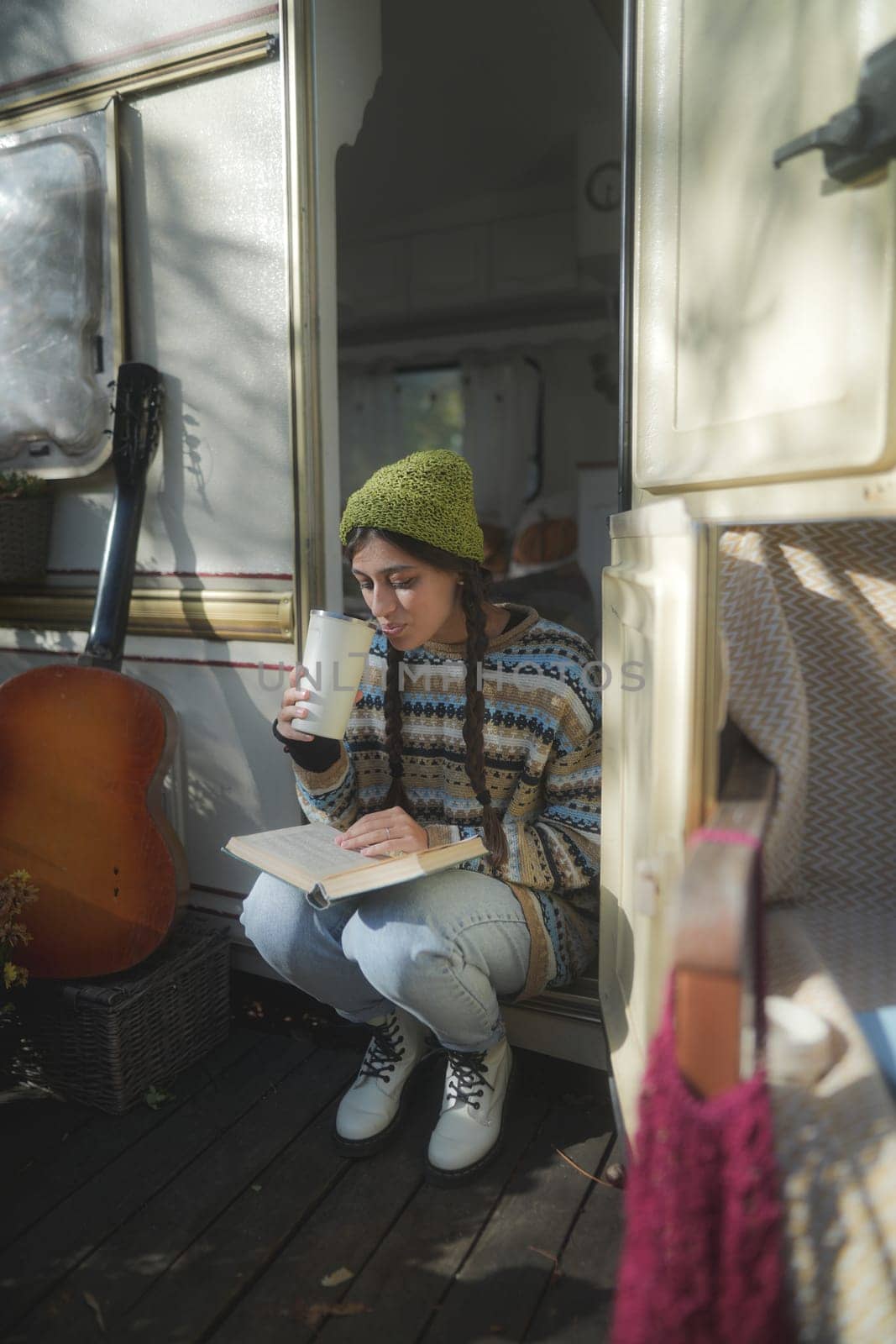 A captivating depiction of a stylish lady channeling vintage hippie vibes. High quality photo