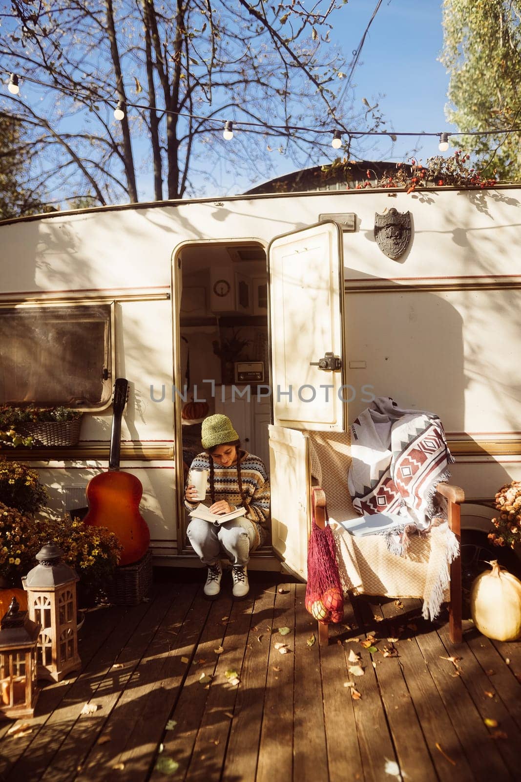 A stunning depiction of a fashionable young lady in retro hippie style. High quality photo