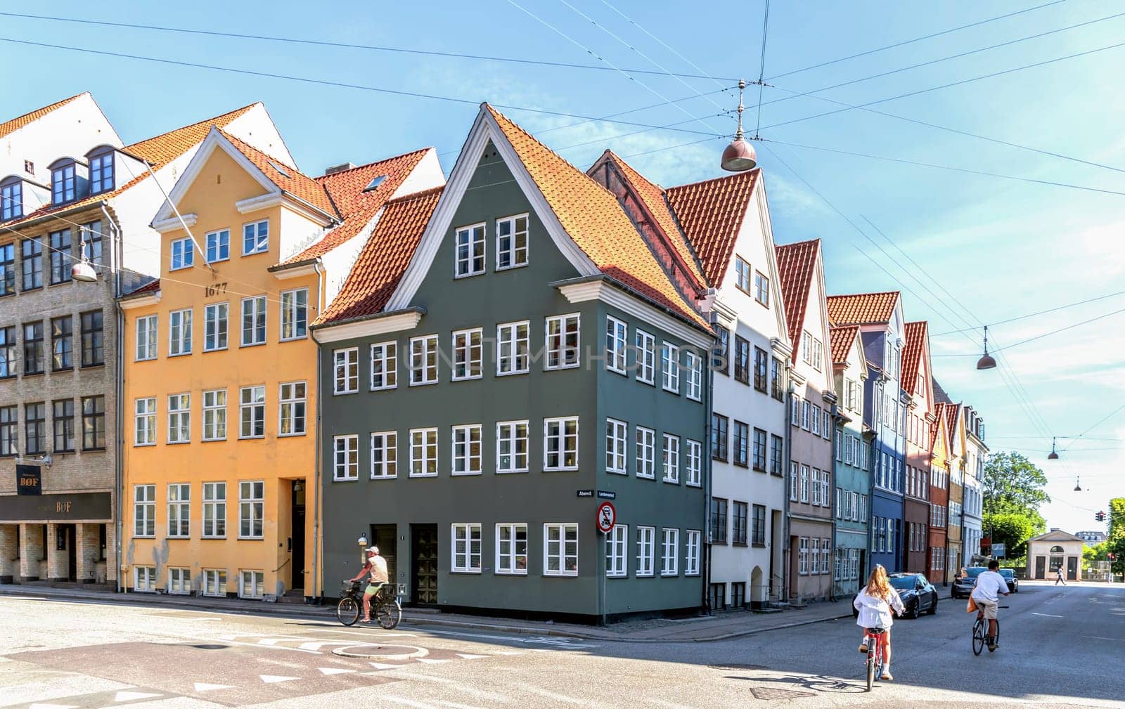 Downtown Copenhagen with old colored houses on a sunny day. Copenhagen, Denmark - September 30, 2023