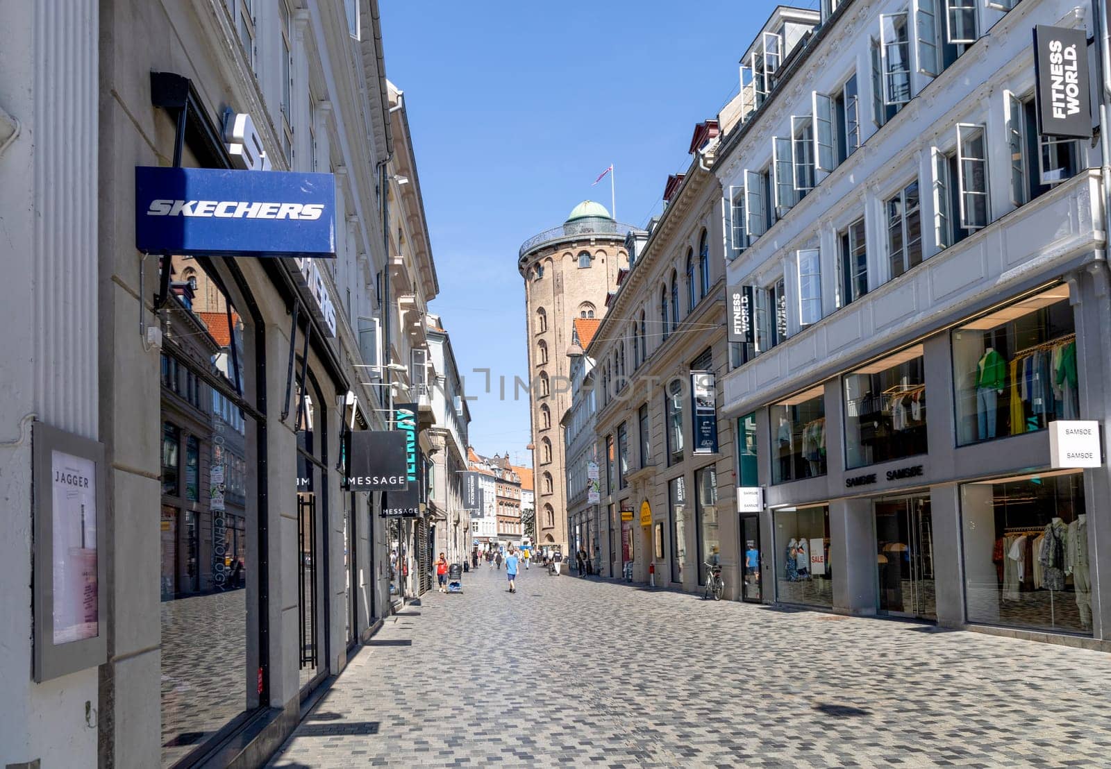 Downtown Copenhagen with old colored houses on a sunny day. Copenhagen, Denmark - September 30, 2023