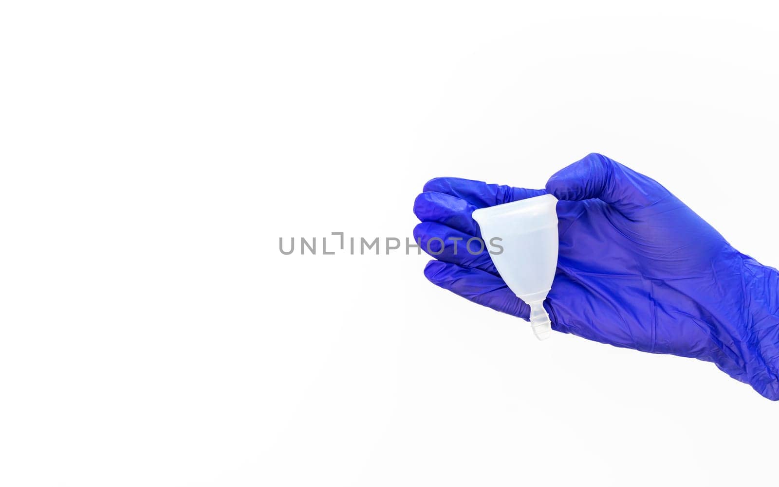 Mockup World Menstrual Hygiene Day On May, 28. Isolated Human Hand in Glove Holds Menstrual Cup on White Background. Backdrop Copy Space, Horizontal Plane, Design by netatsi