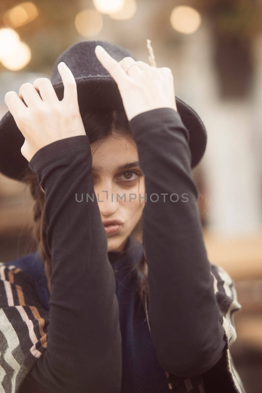 An enchanting portrayal of a trendy young woman embracing retro hippie fashion. High quality photo