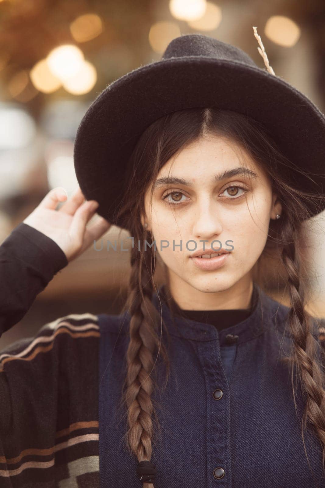 An alluring portrayal of a fashionable woman in a retro hippie ensemble. High quality photo