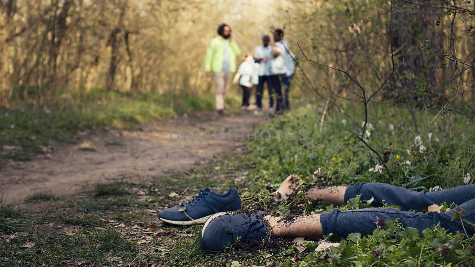 Rescuers group finding murdered barefoot victim in the forest by DCStudio