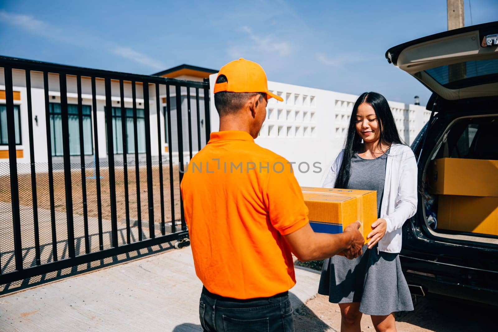 Efficient delivery service illustrated as a courier hands a cardboard parcel to a smiling woman customer at her home emphasizing modern home delivery logistics.