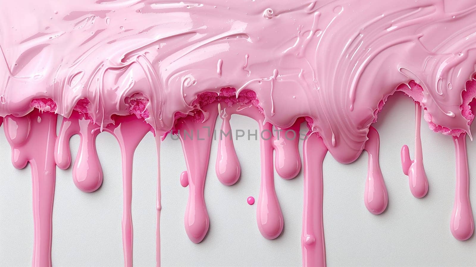 Pink icing flows down the white background from top to bottom.