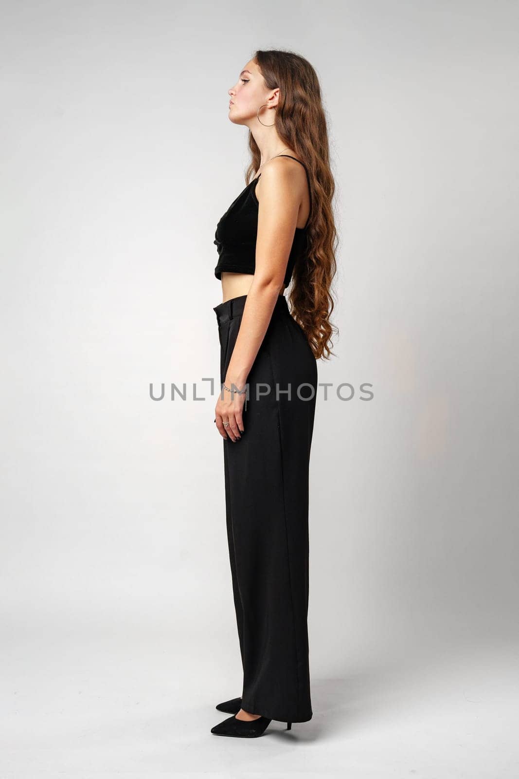 Woman in Black Crop Top and Pants by Fabrikasimf