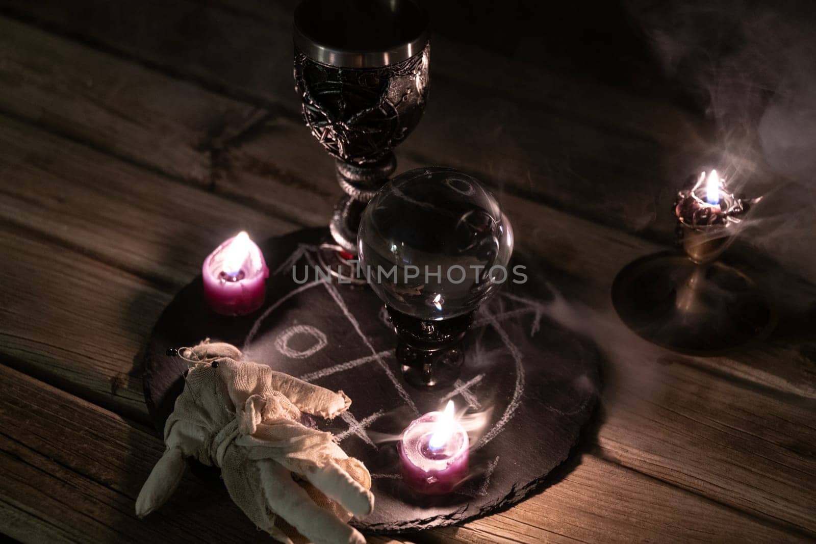 Mysterious Occult Ritual Setup with Crystal Ball and Candles. by jbruiz78