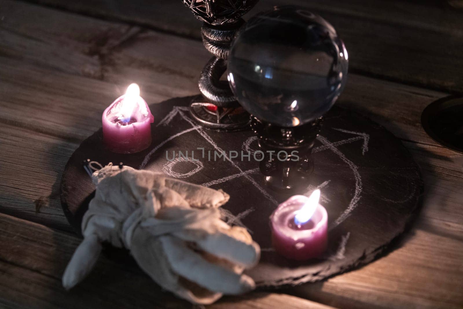 Mysterious Occult Ritual Setup with Crystal Ball and Candles. by jbruiz78