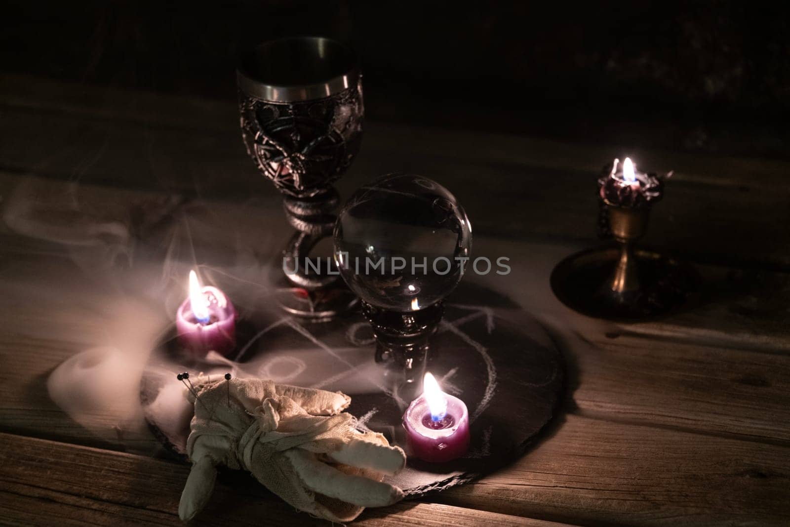 Mysterious Occult Ritual Setup with Crystal Ball and Candles. by jbruiz78