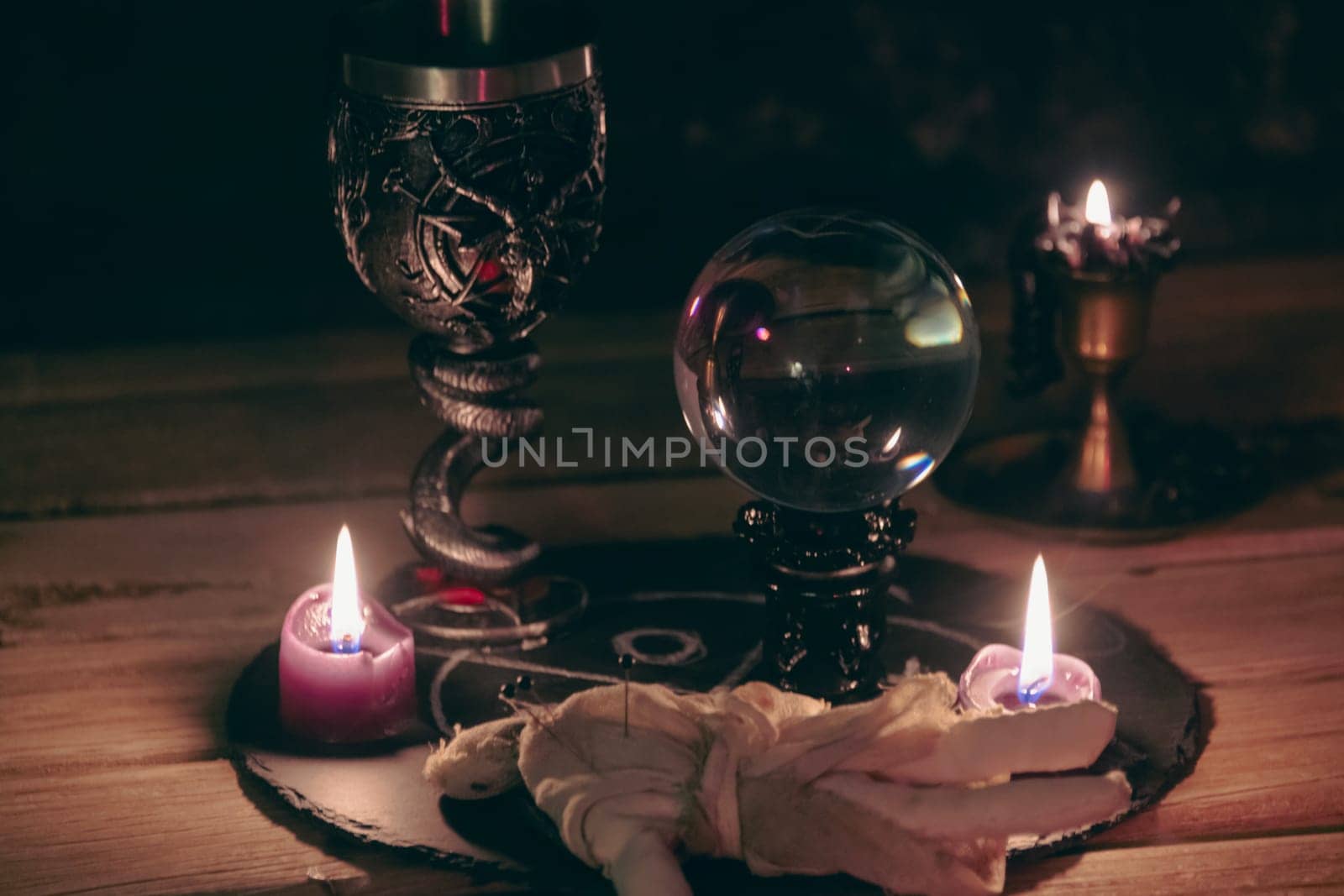 Mysterious Occult Ritual Setup with Crystal Ball and Candles. by jbruiz78