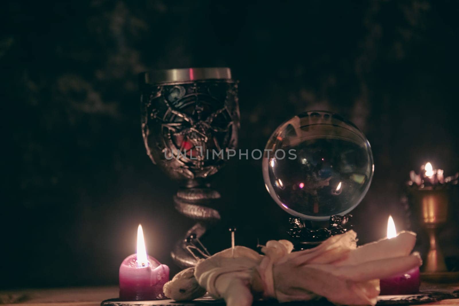 Enigmatic Occult Ritual with Chalice and Crystal Ball