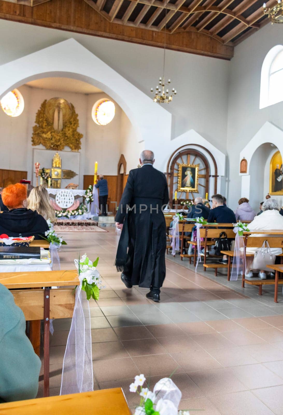 05.05.2024 - Brest, Belarus - People gathered for mass at Roman catholic church. Religion by pazemin