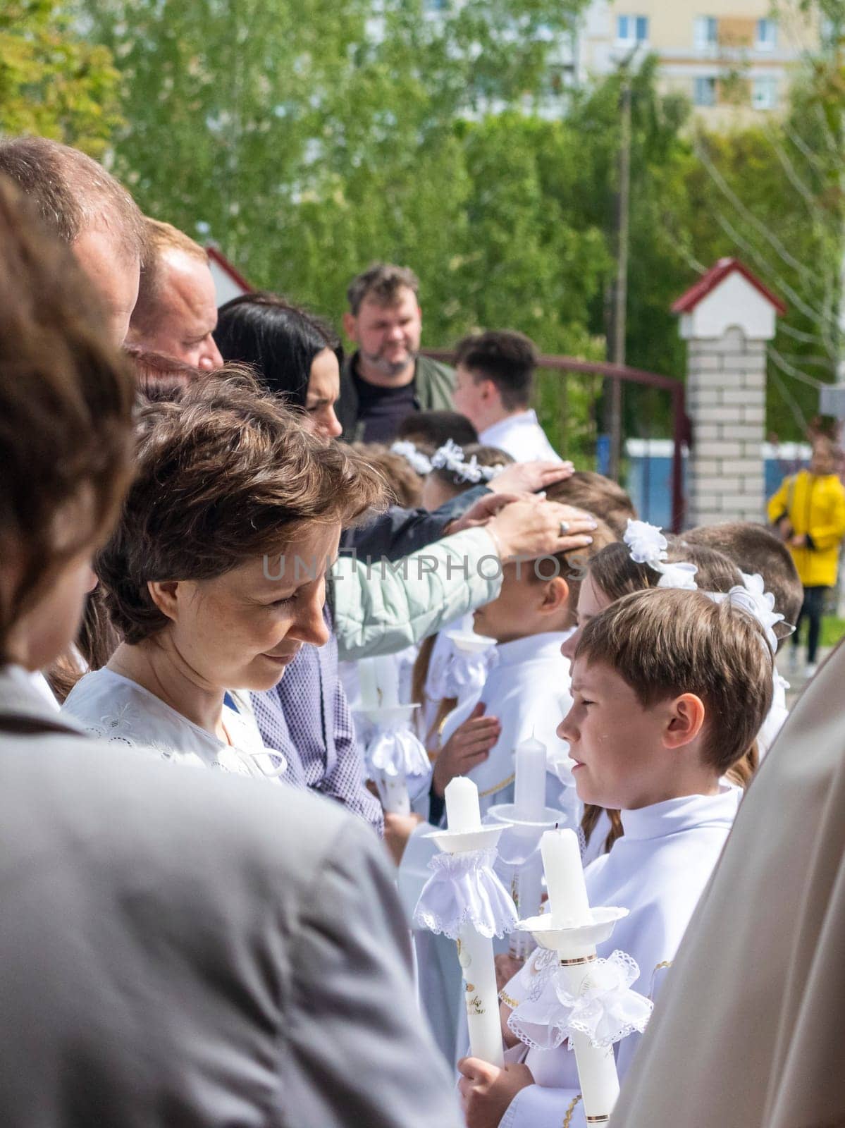 05.05.2024 - Brest, Belarus - People gathered for first communion mass at Roman catholic church. Religion by pazemin