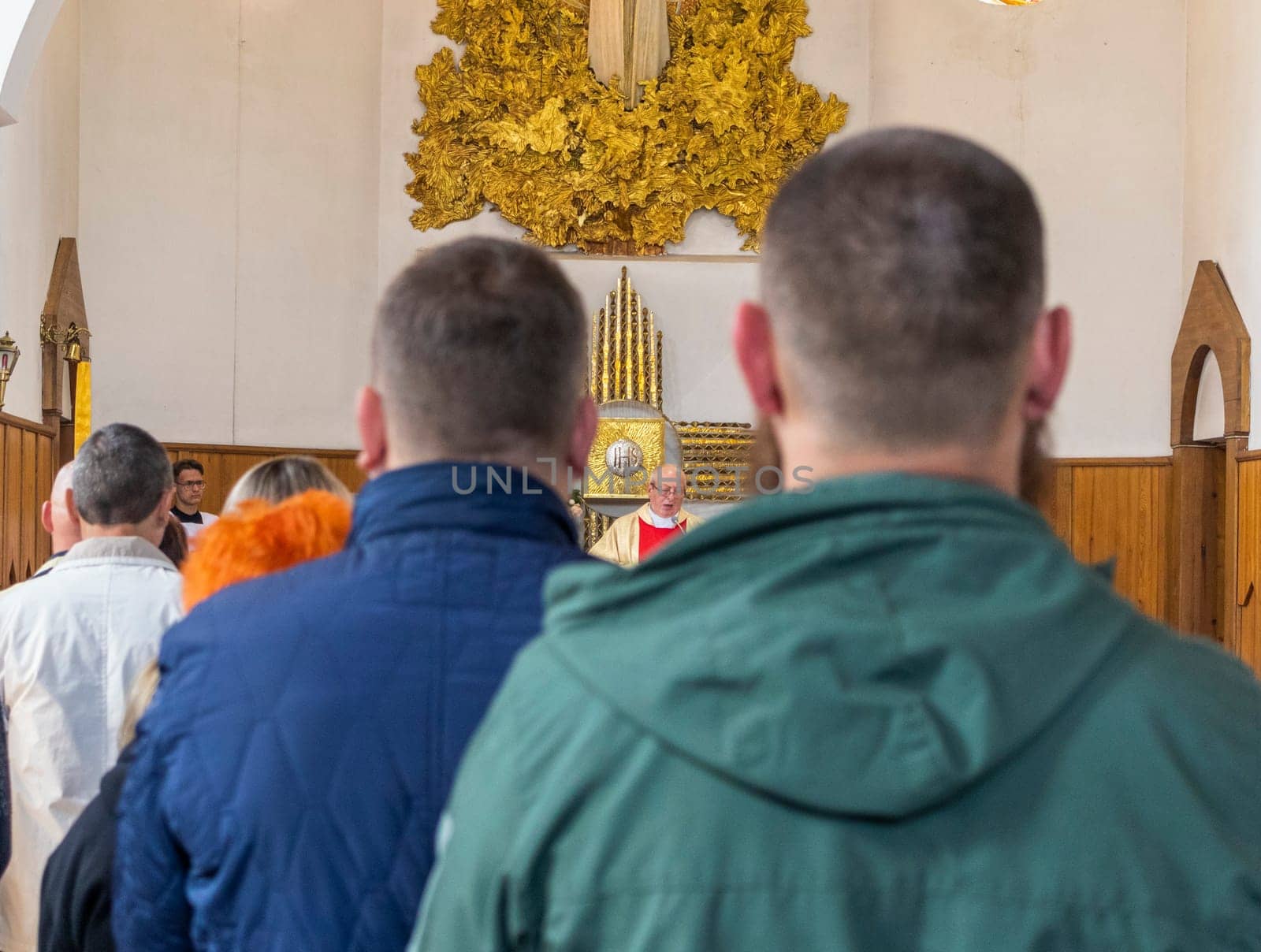 05.05.2024 - Brest, Belarus - People gathered for first communion mass at Roman catholic church.Religion by pazemin