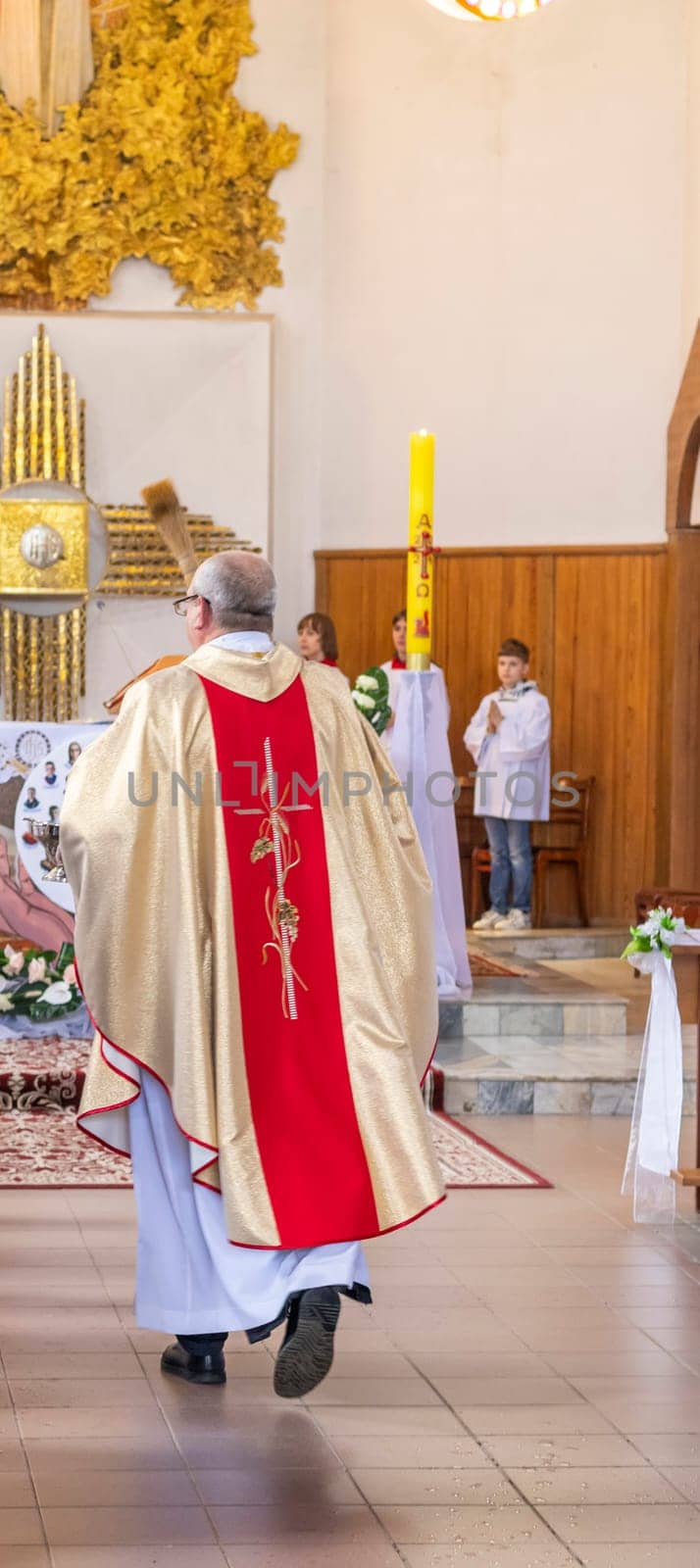 05.05.2024 - Brest, Belarus - People gathered for first communion mass at Roman catholic church.