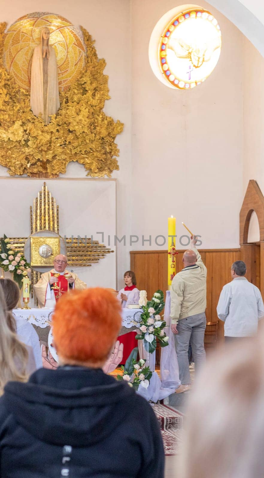 05.05.2024 - Brest, Belarus - People gathered for first communion mass at Roman catholic church.