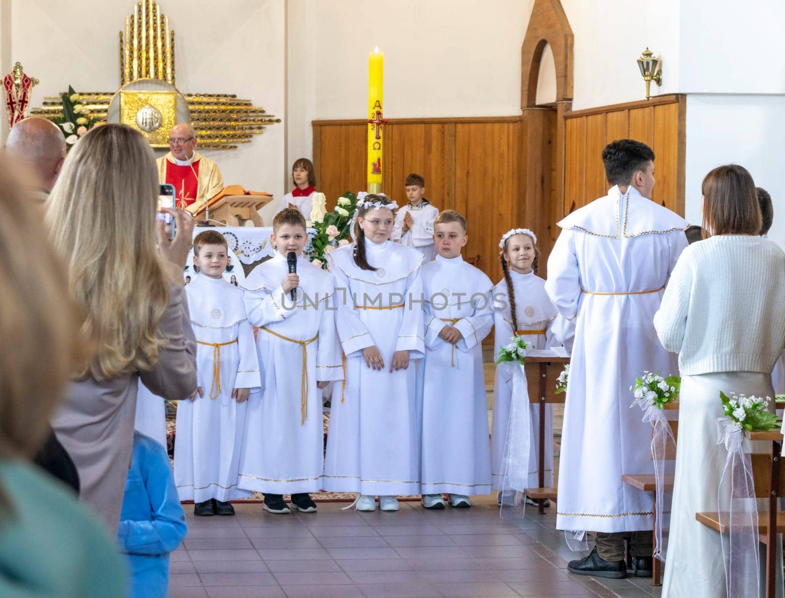 05.05.2024 - Brest, Belarus - People gathered for first communion mass at Roman catholic church.