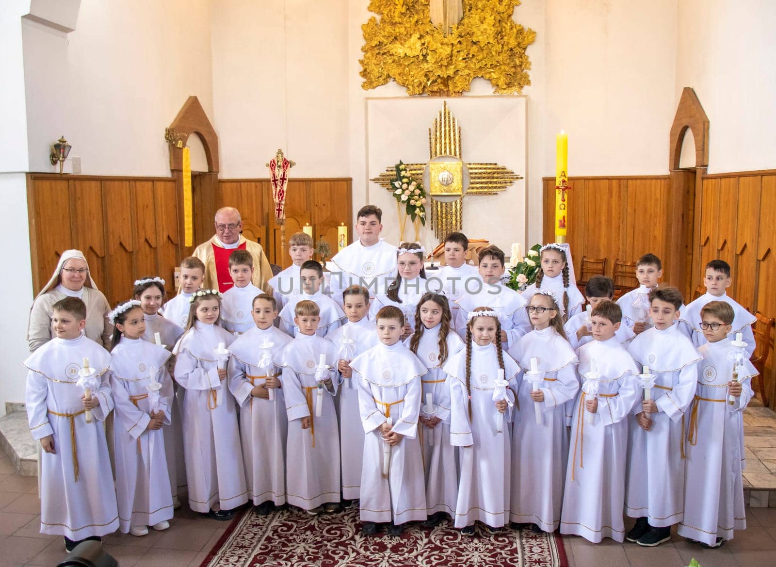 05.05.2024 - Brest, Belarus - People gathered for first communion mass at Roman catholic church.