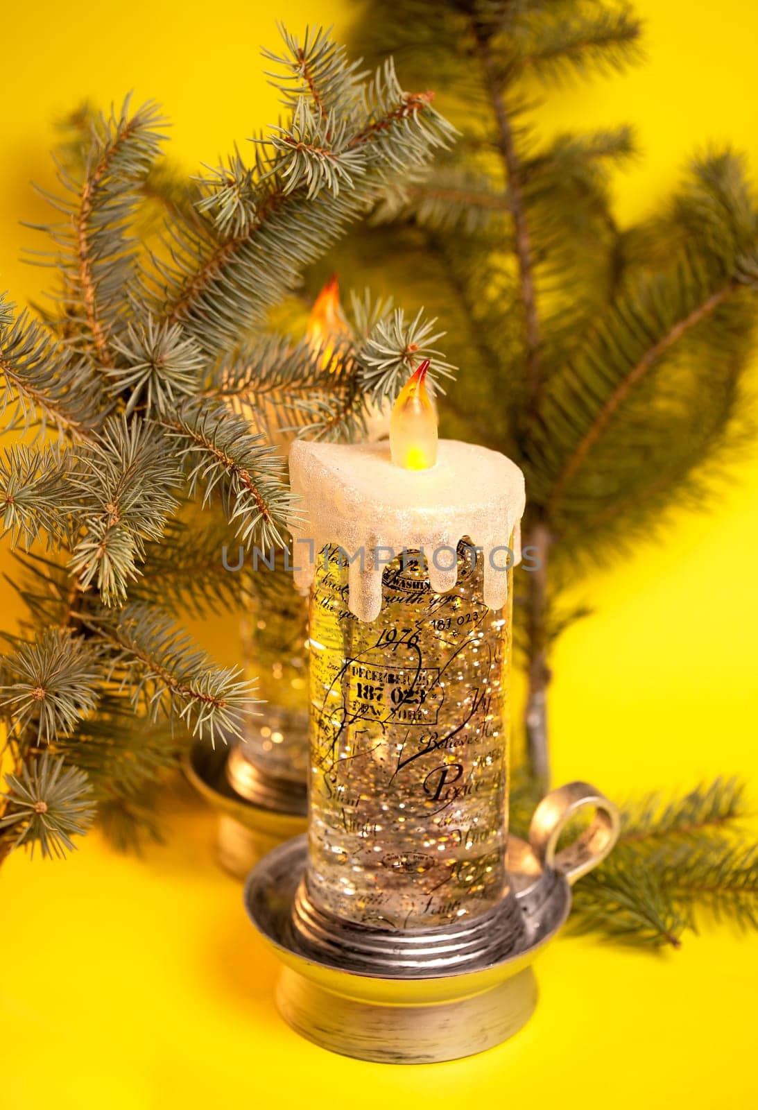 christmas glowing candle in new year background by Pukhovskiy