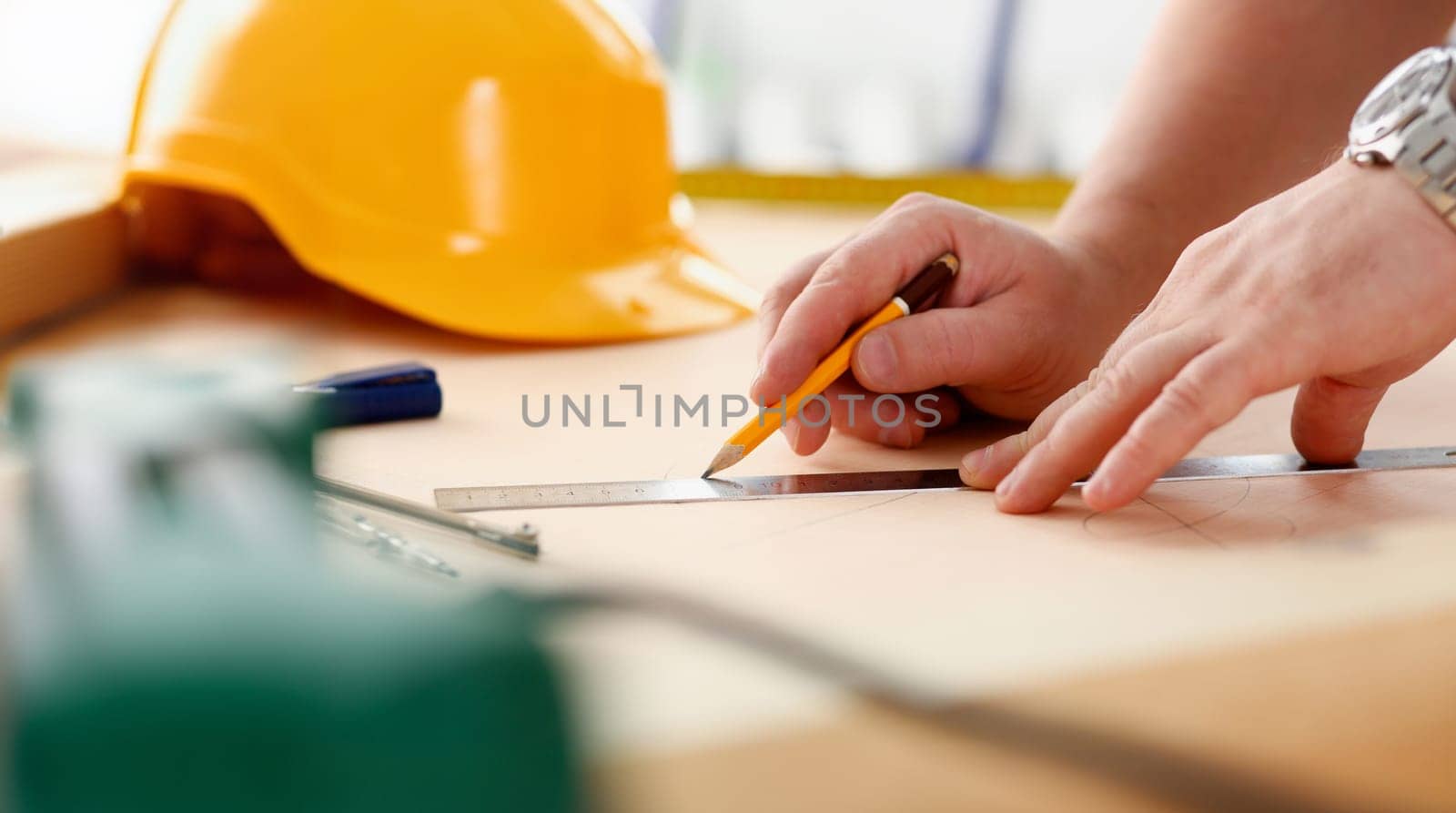 Arms of worker making structure plan on scaled paper closeup. Manual job DIY inspiration improvement job fix shop graphic joinery startup workplace idea designer career industrial education