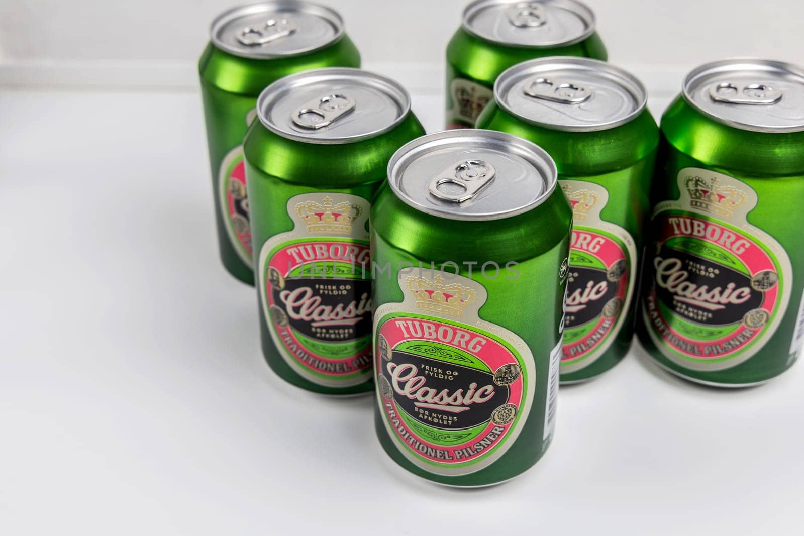 Danish beer in cans Tuborg Classic. The most popular beer. Copenhagen, Denmark - March 4, 2024.