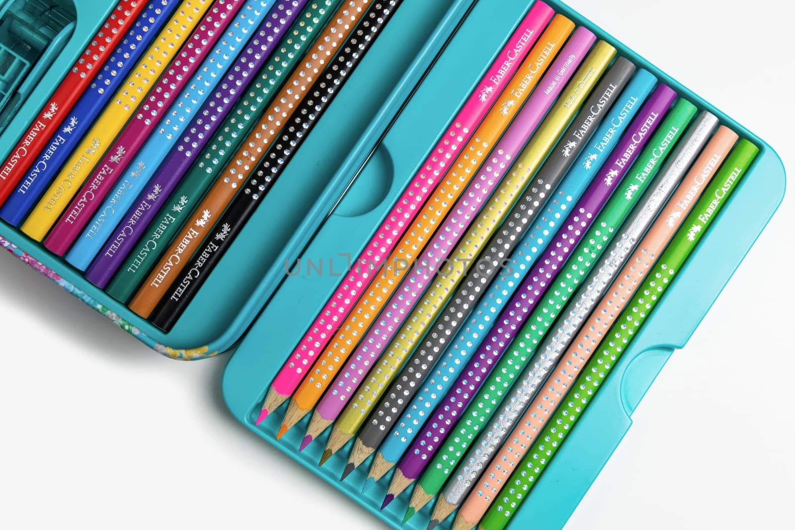 Colored pencils for drawing various colors on a white background. Copenhagen, Denmark - January 24, 2024