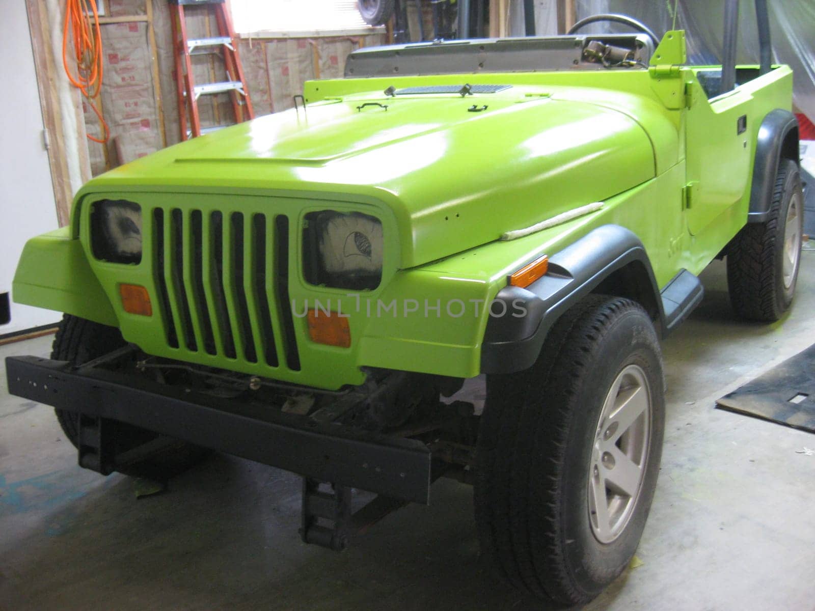 Vehicle with Eyes for Headlights, Lime Green Paint Job, 1990s Vehicle . High quality photo