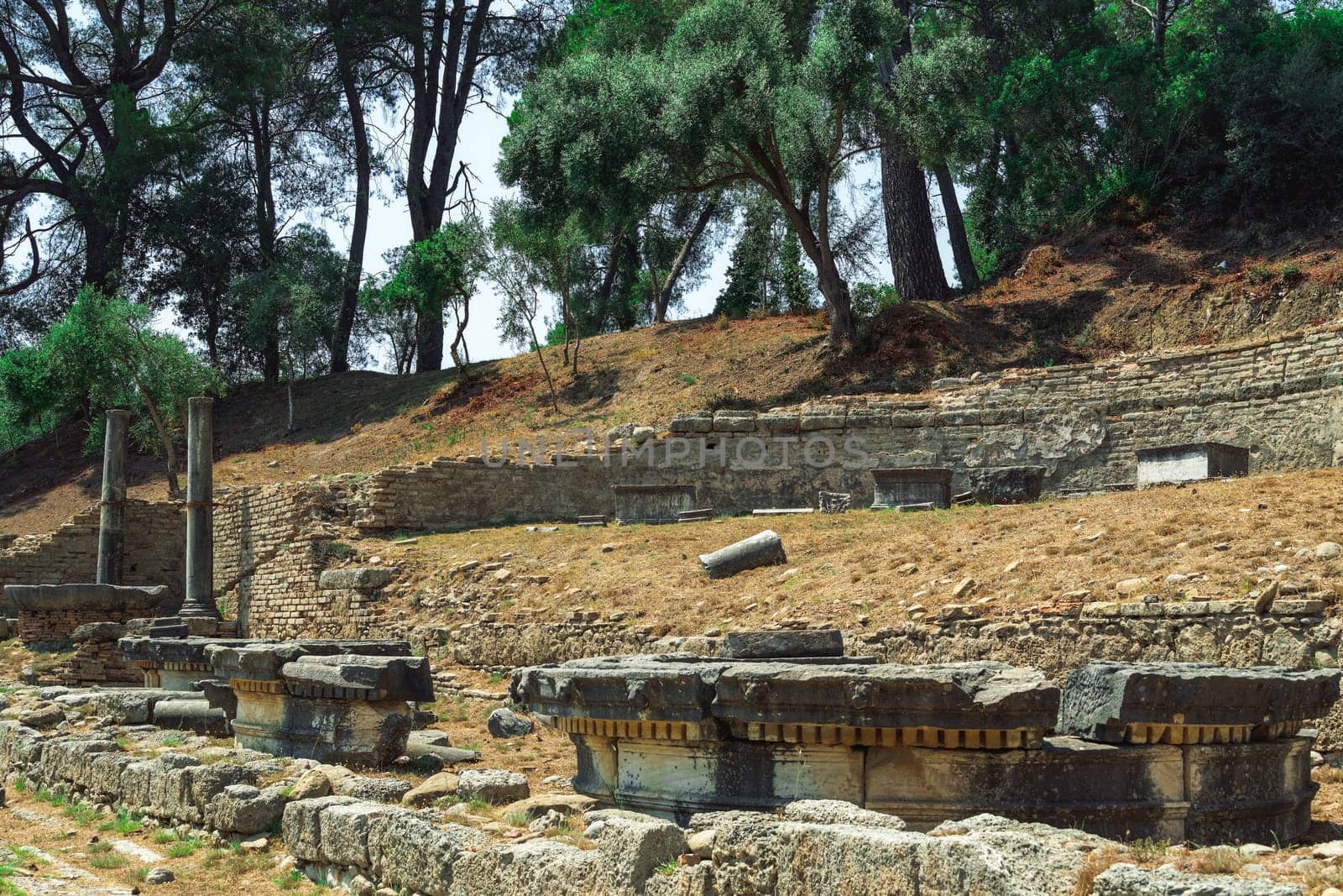 Ancient ruins on the Archaeological Site of Olympia, Greece. by bestravelvideo