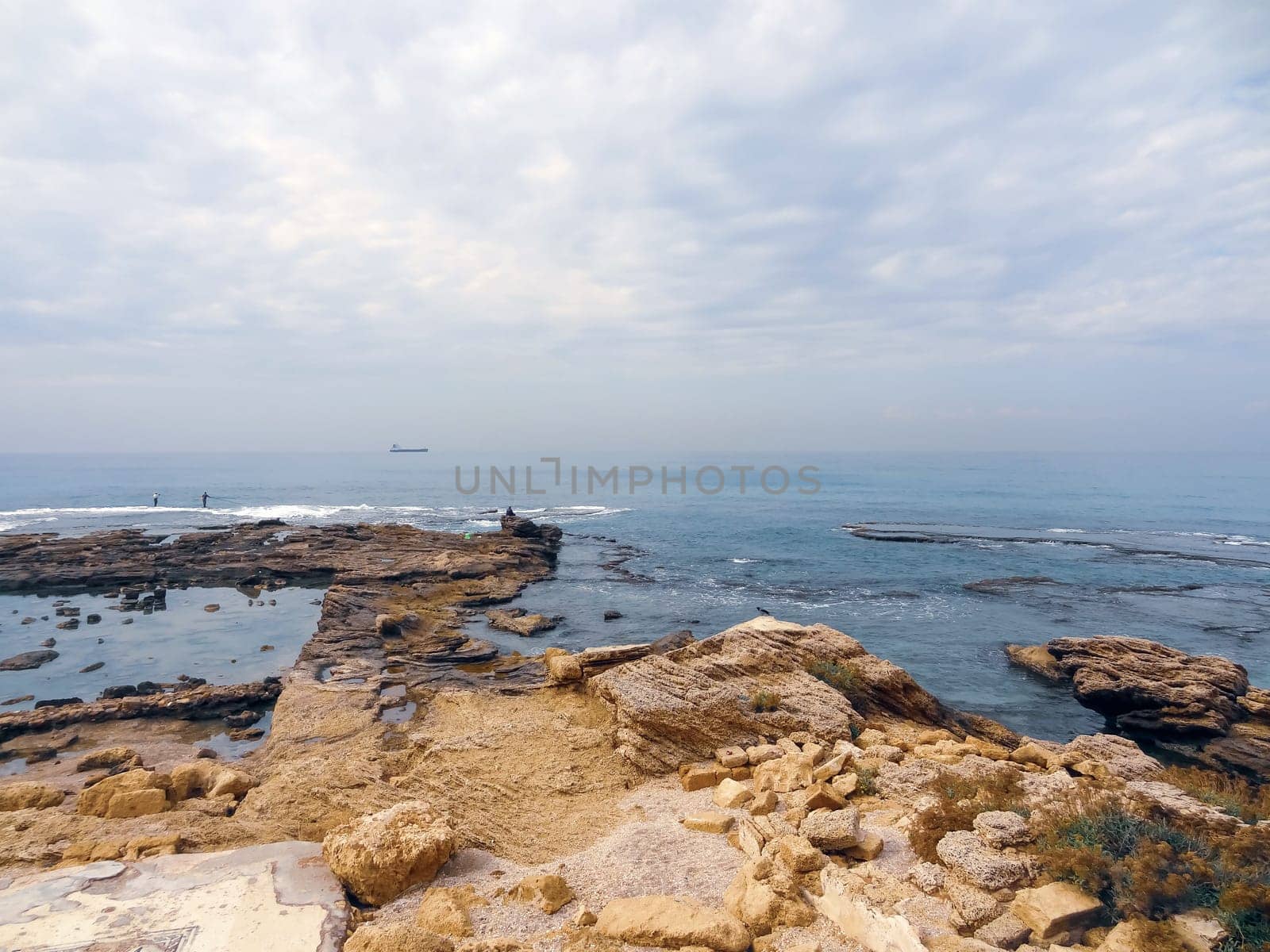 Rocky coast near the ancient Caesarea national park on the Mediterranean coastline, Israel. High quality photo